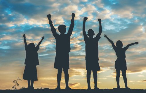 Silhouette of children playing Silhouette of children playing